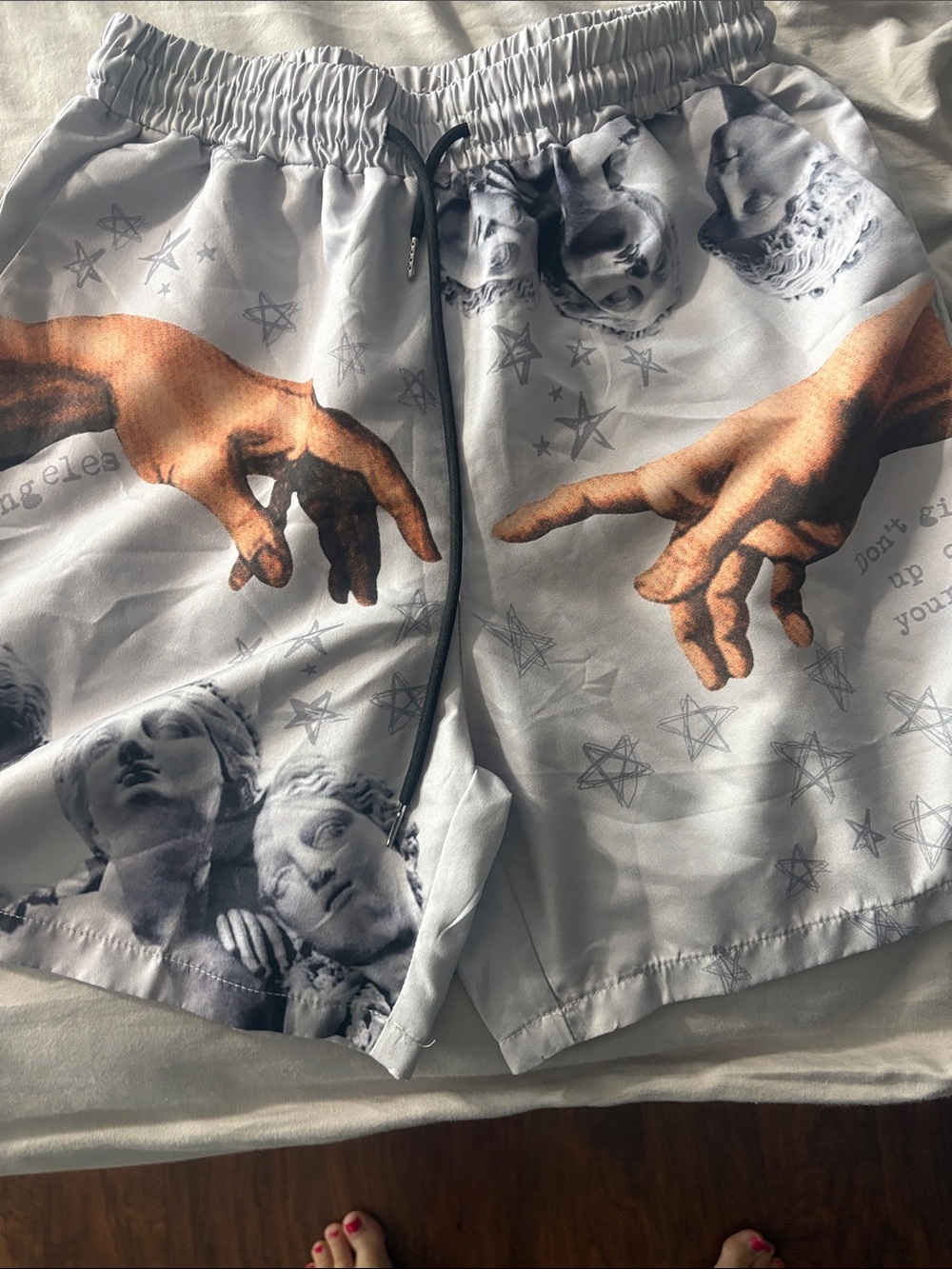 ROMWE White Athletic Shorts with Classical Sculpture & Hand Print